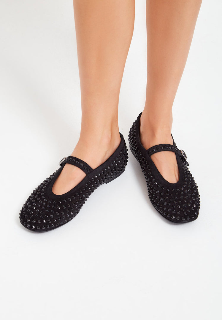 A pair of elegant black leather ballerinas adorned with rhinestones, perfect sparkly shoes for women's dress shoes.