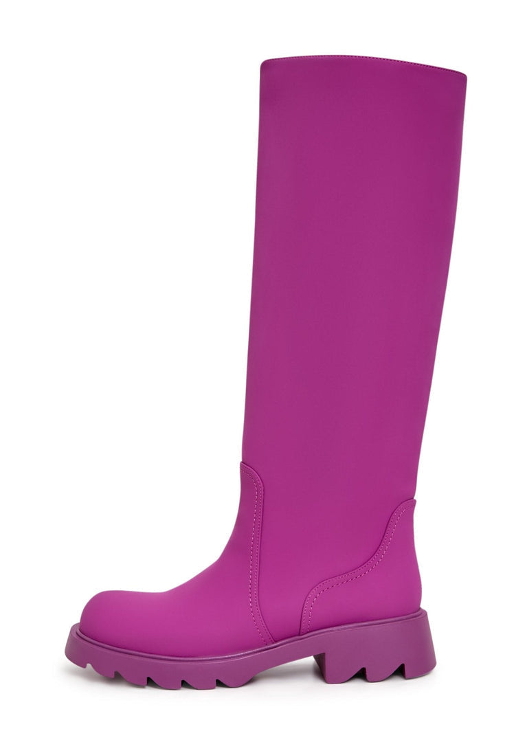 A trendy pair of women's pink knee-high boots with a chunky sole, ideal for fashion-forward individuals seeking stylish footwear.