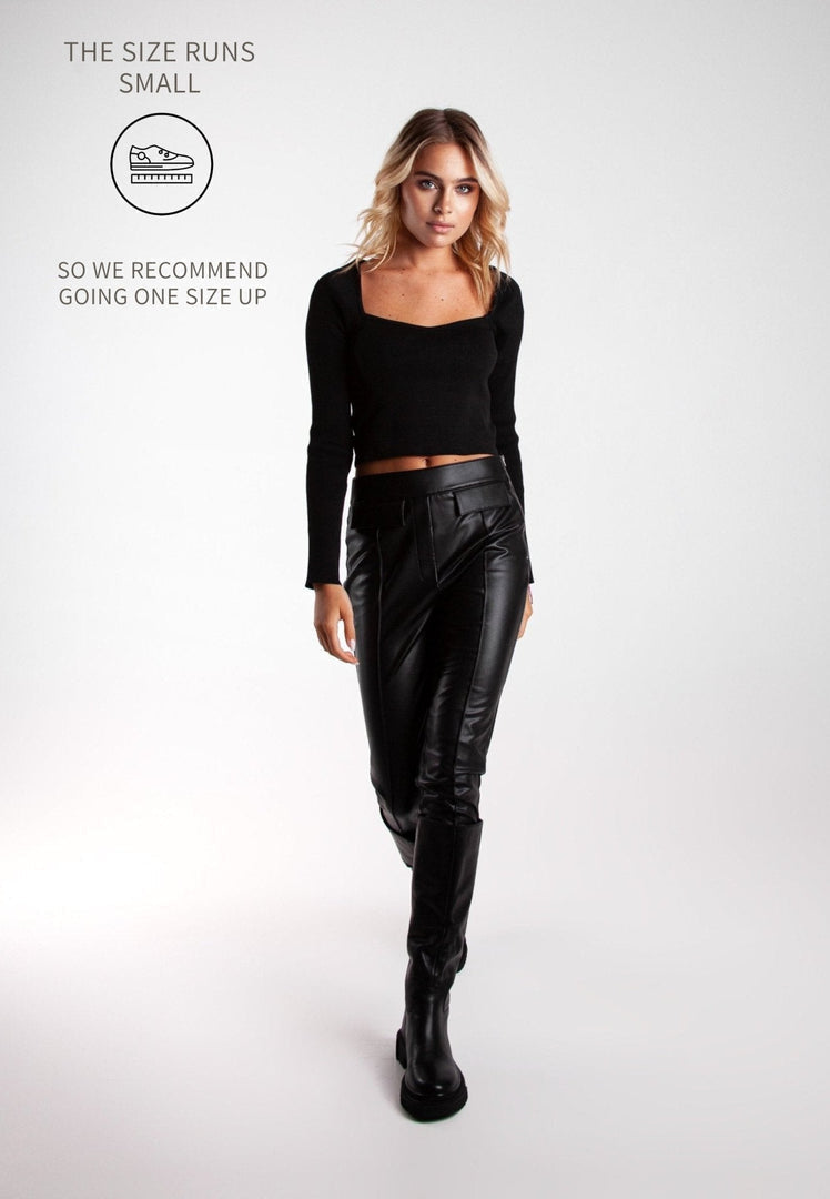 A pair of high-quality leather knee-high boots in black, featuring the classic Anastasia design for women.