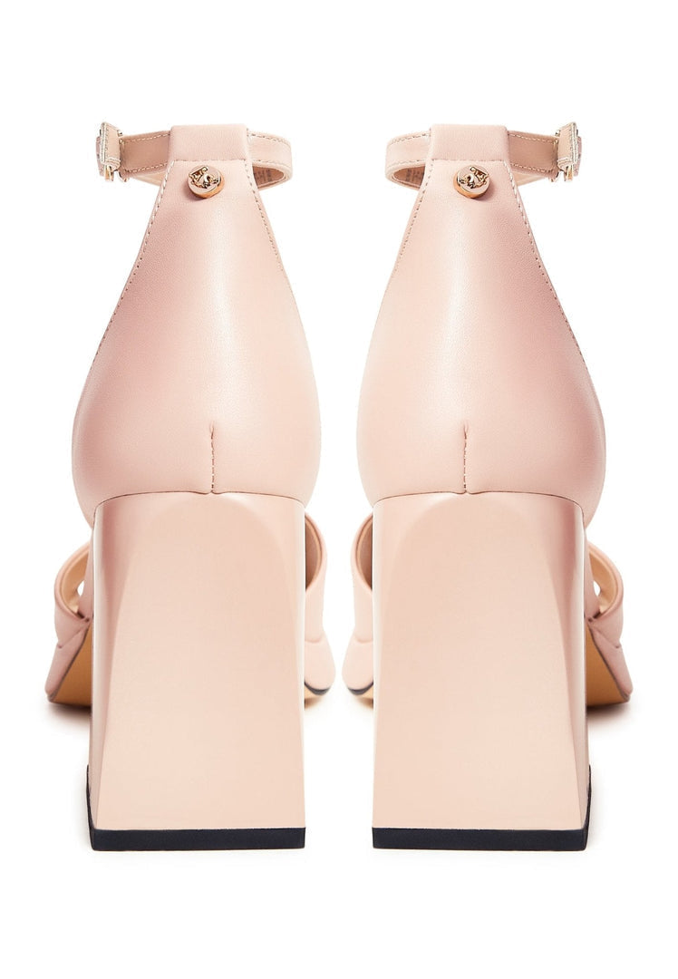 A stylish pair of beige open toe high heel sandals - classic high heel sandals in a neutral shade perfect for any outfit.