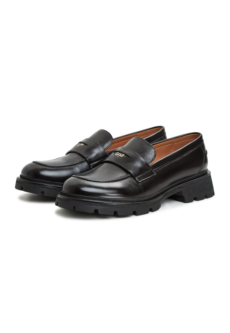 A stylish pair of Mariana black leather loafers with platform soles for women's footwear fashion.