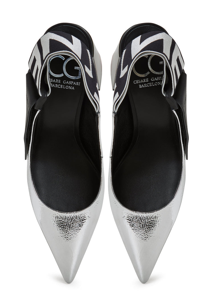 A fashionable pair of silver Jimena block heeled pumps slingback heels for women's footwear.