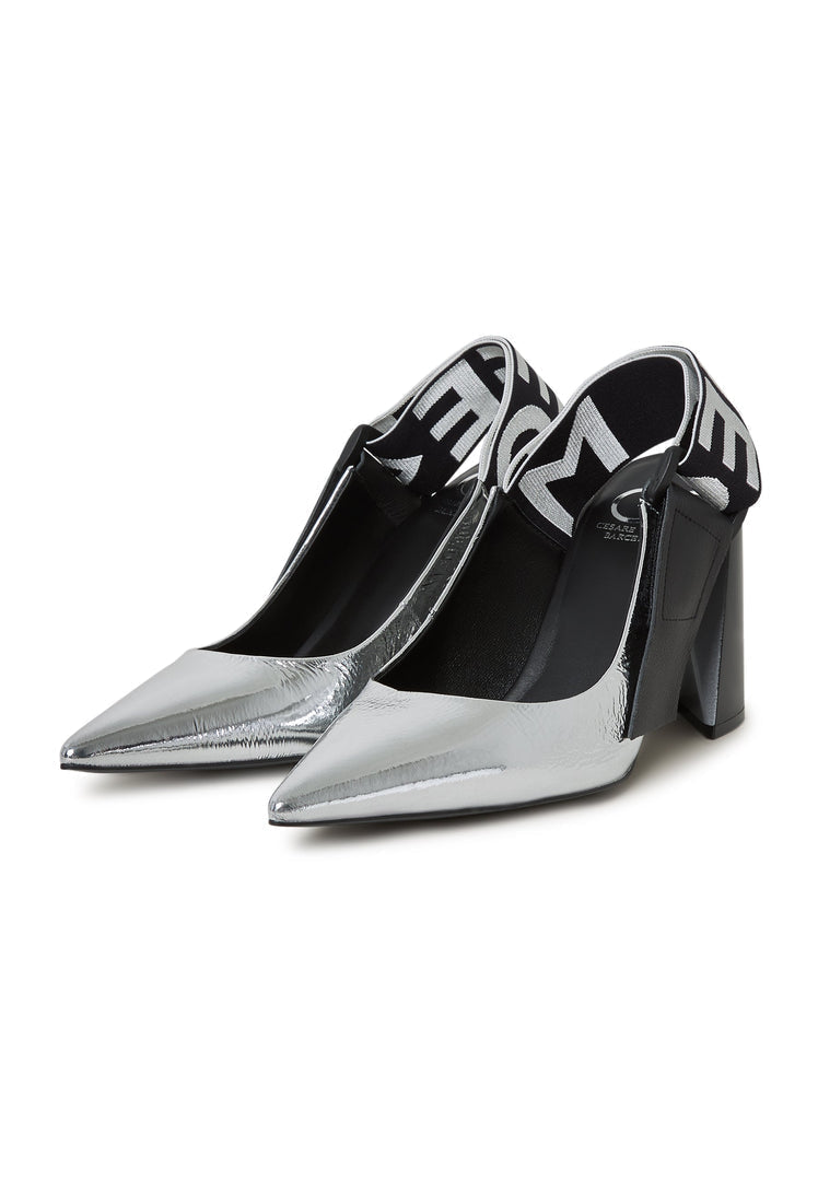 A pair of stylish silver Jimena pumps featuring block heeled and slingback design, perfect for women's footwear fashion.