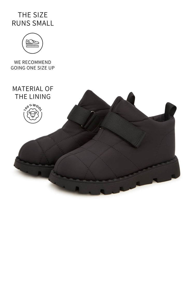Stay warm and stylish this winter with black suede wool-lined winter boots that are perfect for any snowy day.