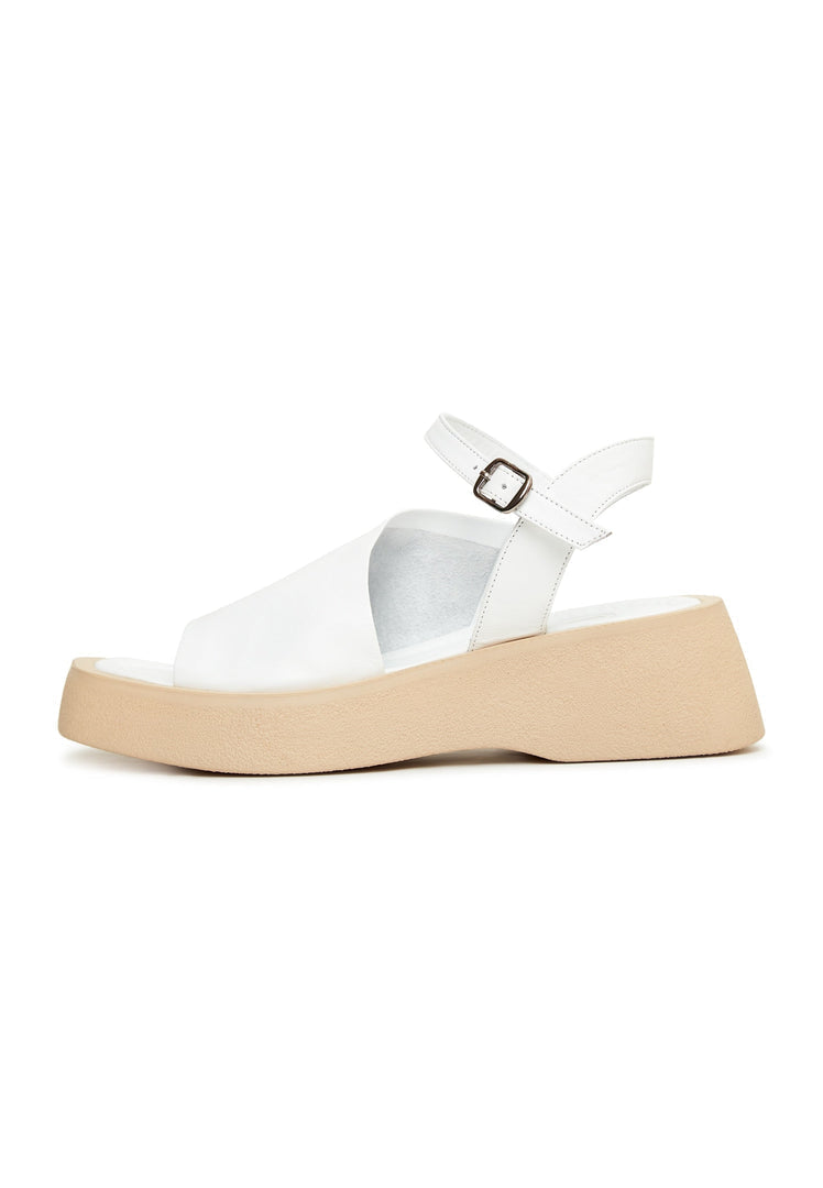 A pair of stylish white casual platform sandals - the best white platform sandals for a comfy and trendy look.