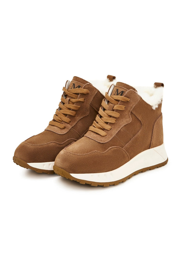 A stylish pair of brown flat sole winter boots, perfect for cold weather fashion and comfort.