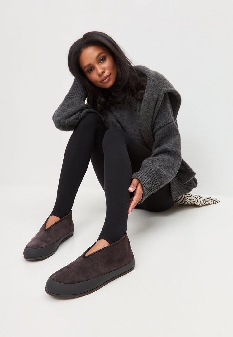 A pair of stylish women's slip-on Amara brown leather winter boots.