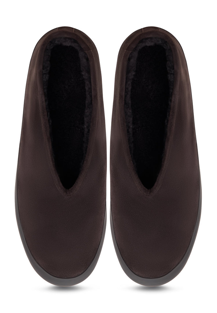 A pair of stylish brown leather slip-on winter boots, featuring the Amara style for women.