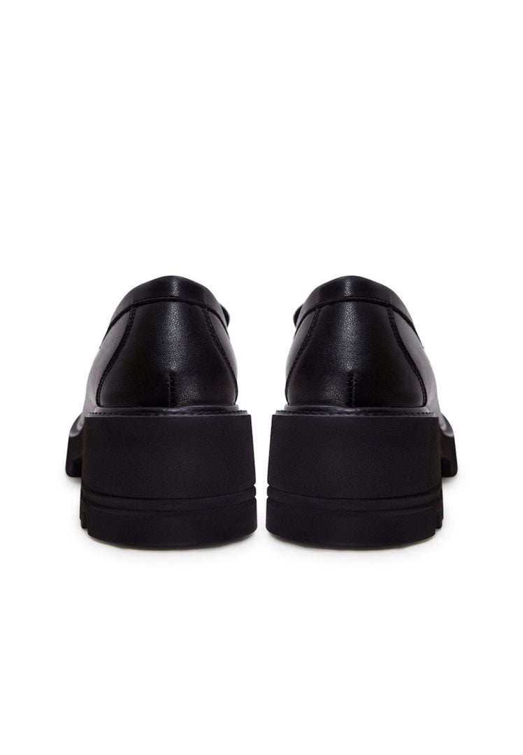 A stylish collection of leather loafers, classic black heels, block heel shoes, and black leather shoes for women.