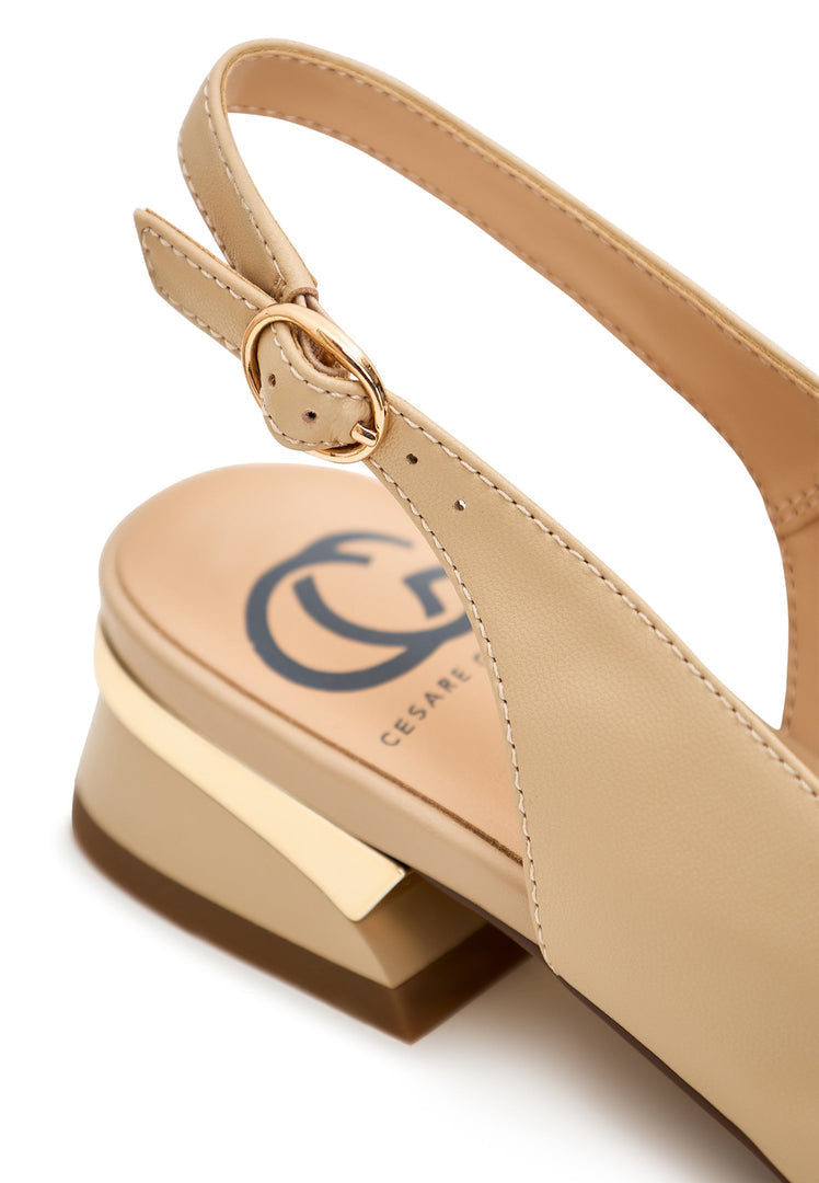A pair of stylish beige slingback ballerinas, perfect women's footwear for a trendy and comfortable look, ideal ballet flats for fashion-forward outfits.