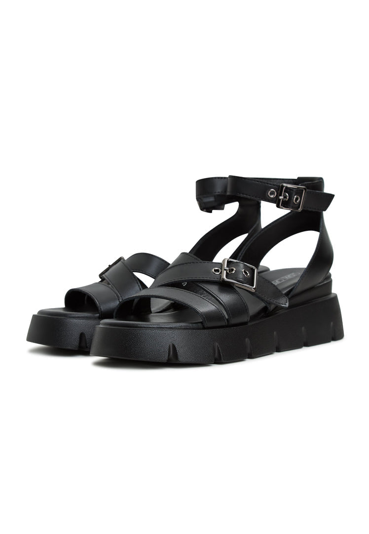 Platform leather sandals with criss-cross straps, perfect for summer days. Buy platform leather sandals online.