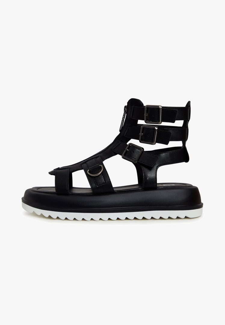 A pair of stylish urban platform sandals with a unique design and trendy appeal.