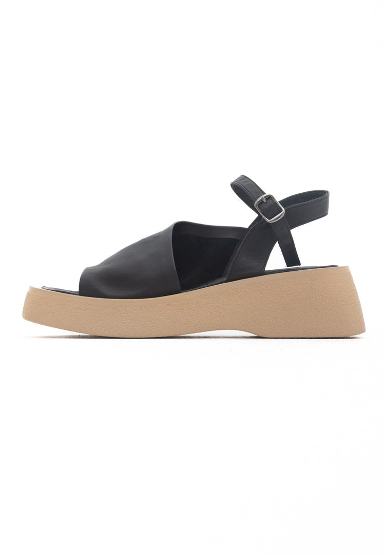 A pair of stylish black women's platform sandals, perfect for a casual and comfortable look.