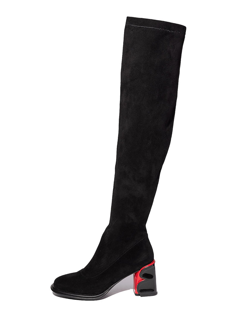 A stylish pair of black suede shoes, showcasing sophisticated suede footwear in the latest suede shoe trends of black suede fashion.