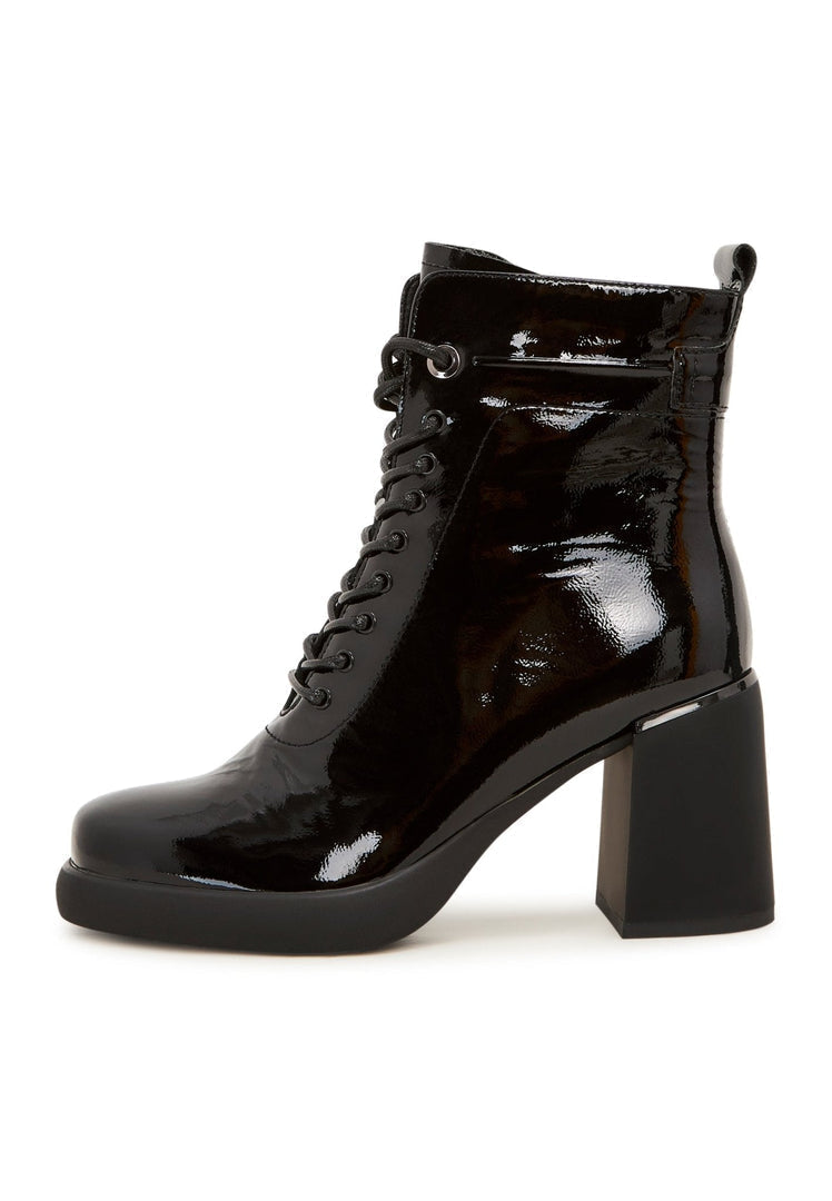 A pair of trendy black high heeled ankle boots, a must-have classic in women's fashion.