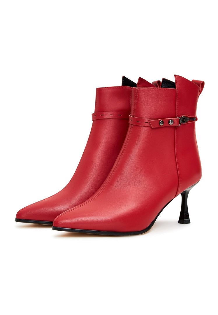 A trendy pair of stylish high heeled leather ankle boots for women, perfect for a fashionable look.