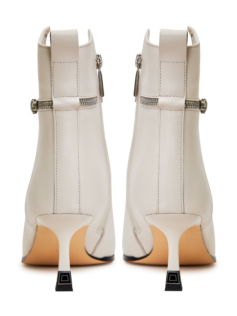 A trendy pair of high heeled leather ankle boots, perfect for any fashion-forward woman's wardrobe.
