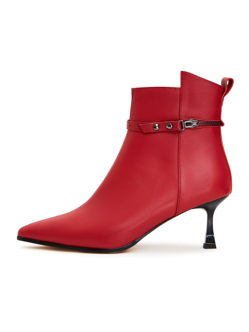 A stylish pair of high-heeled leather ankle boots, perfect for any fashion-forward woman looking for fashionable leather booties.