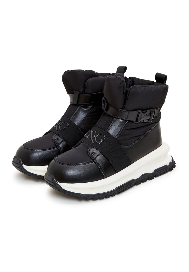 A pair of stylish black ankle sneaker boots, perfect for the winter season and fashion-forward looks.