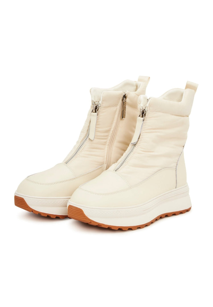 Stay cozy and chic this winter with these stylish ivory platform boots for women - the perfect addition to your winter fashion footwear collection.