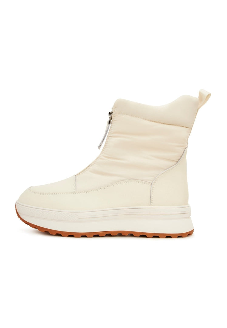A pair of stylish ivory platform winter boots for women, perfect for keeping your feet warm and on-trend all season long.