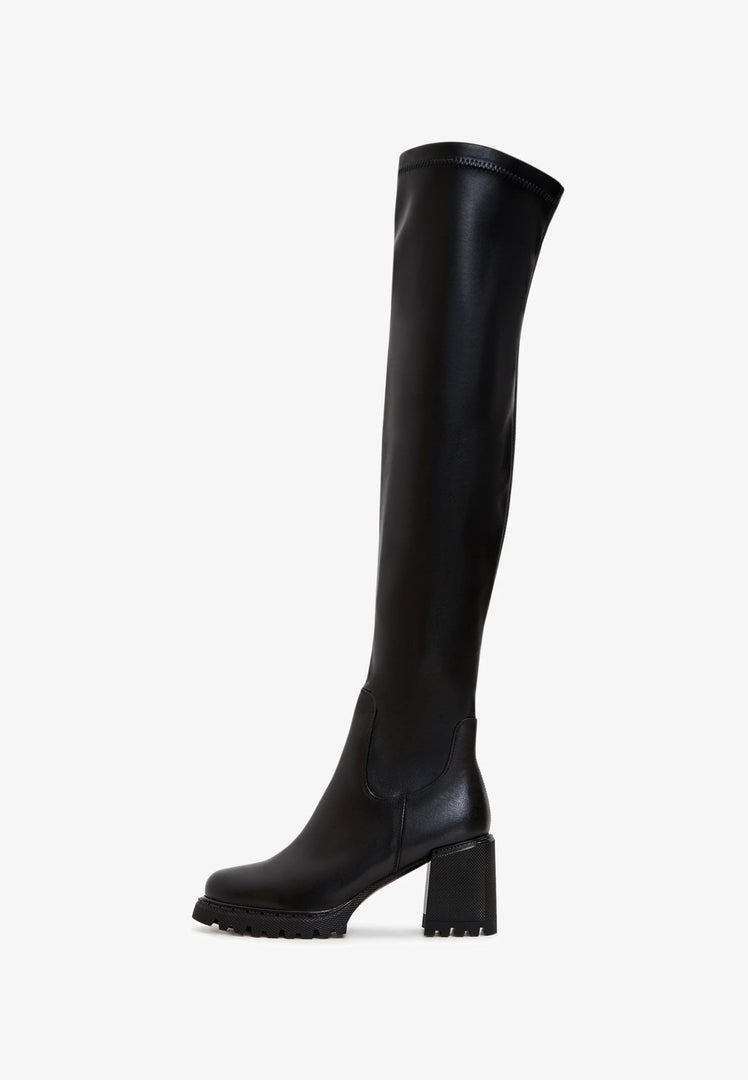 A stylish pair of trendy black over the knee block heel boots, perfect for women's fashion footwear.