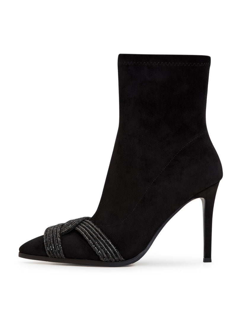 A fashionable pair of suede ankle booties, perfect for a chic and stylish look.