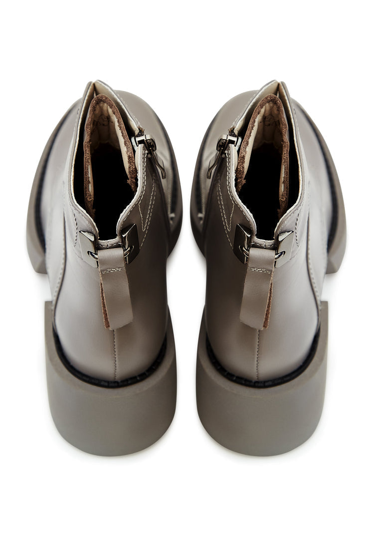 A pair of chic grey ankle boots, perfect for a fashionable and stylish look for women.