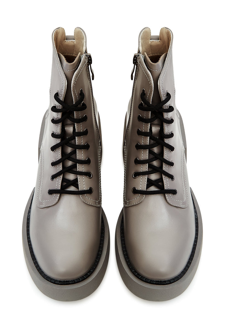 A stylish pair of women's grey ankle boots, perfect for making a chic fashion statement.