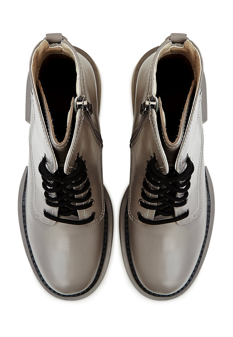 A stylish pair of women's chic grey ankle boots, perfect for any fashionable outfit.