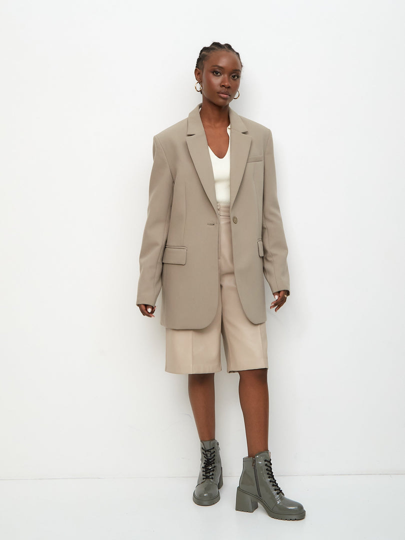 A pair of chic grey ankle boots, perfect for the fashion-forward woman.