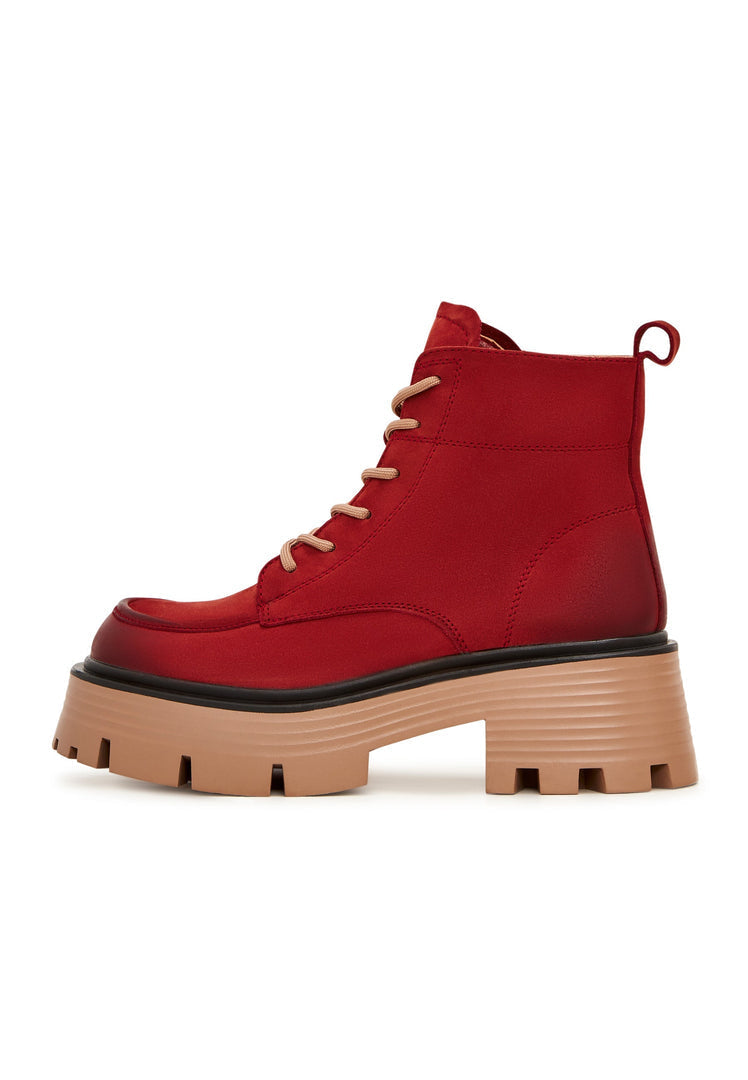 A pair of stylish red ankle boots, perfect for a casual platform look in women's footwear fashion.