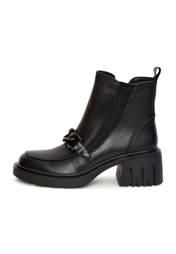A pair of trendy black ankle boots with chunky heels and fashionable chain details.