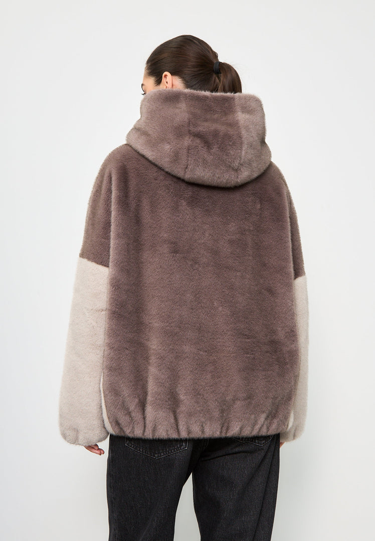 Stay warm and stylish with the Reyna faux fur jacket, a trendy hooded brown faux fur jacket for women's fashion.