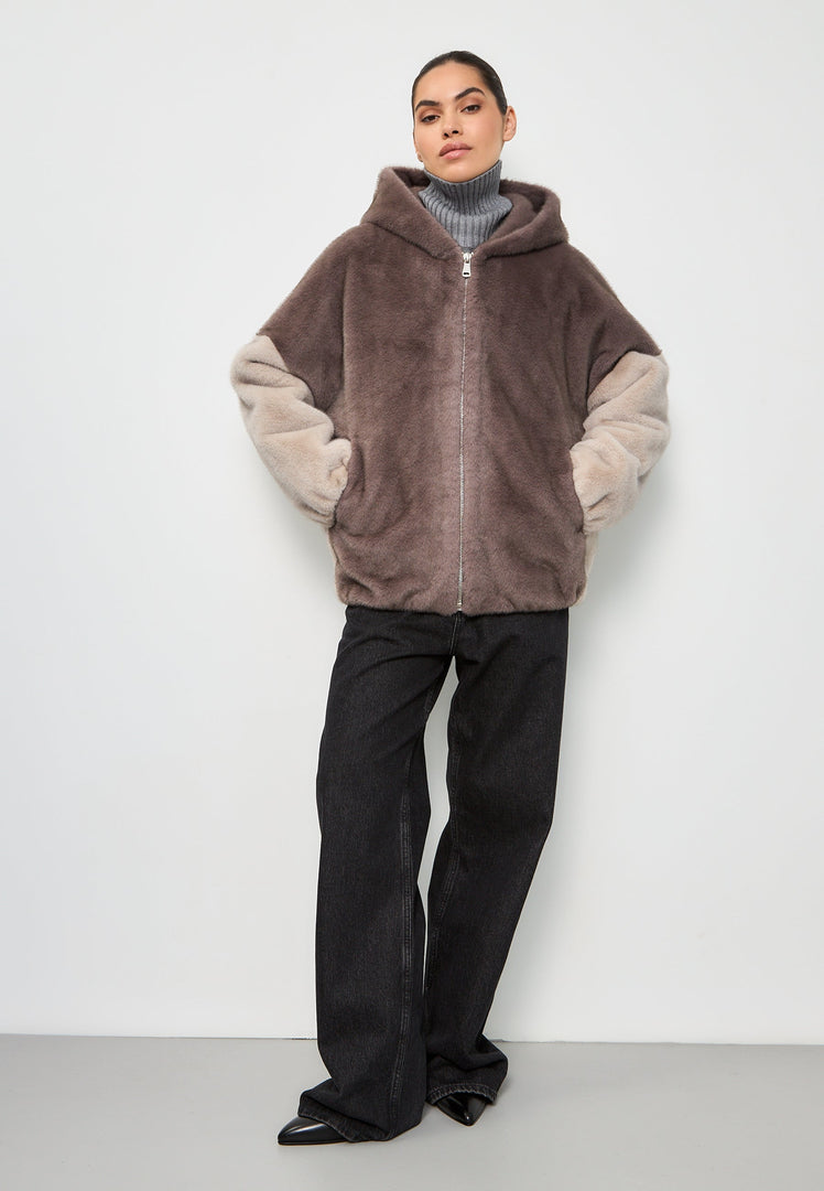 A trendy brown faux fur hooded jacket known as the Reyna, perfect for women's fashion.