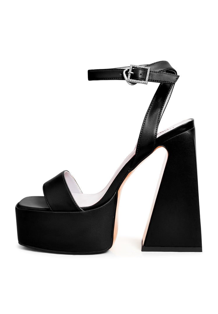 A pair of elegant black sandals with an elevated design.