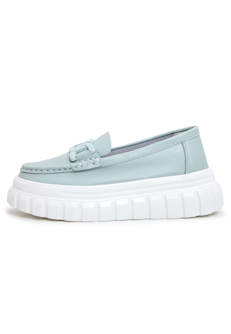 Stylish blue leather platform loafers, perfect for urban fashionable footwear.