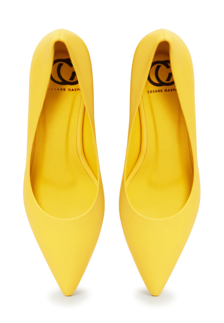 A pair of stunning yellow luxury pumps, the epitome of elegant footwear with designer heels, representing high-end shoes.