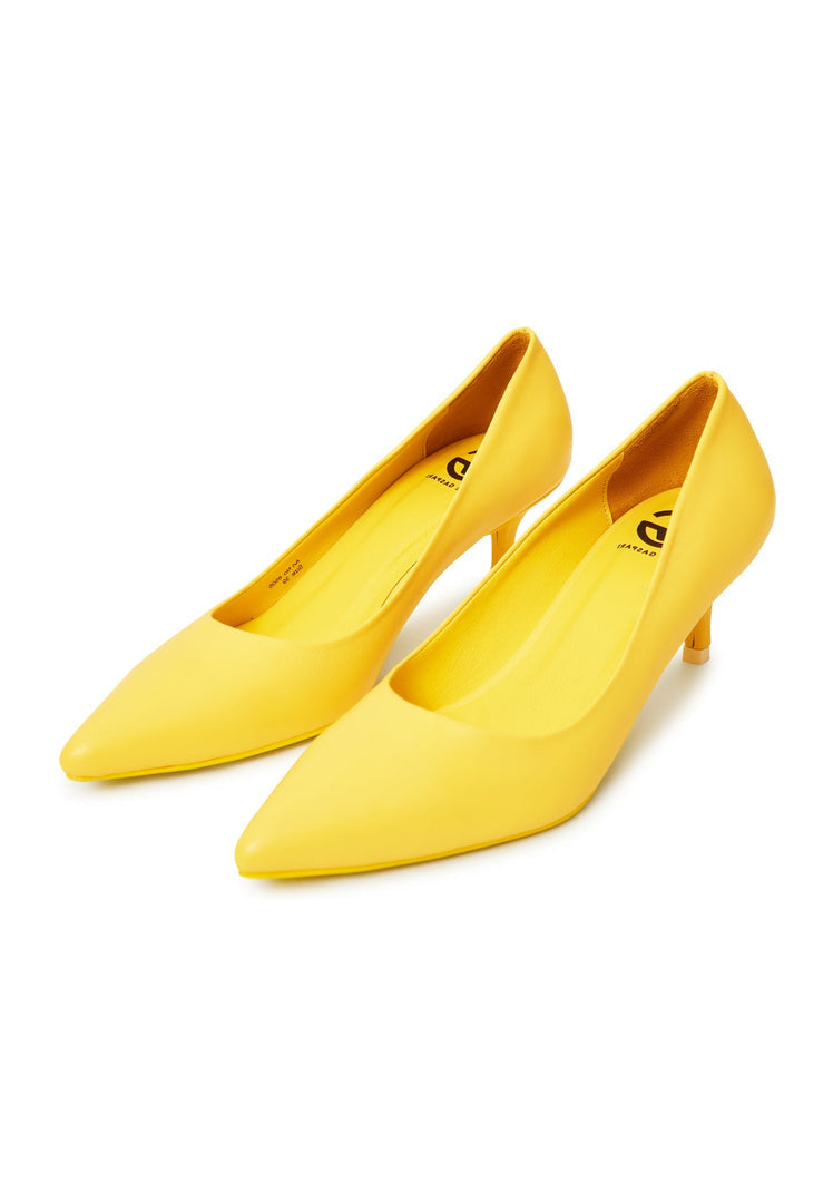 A stylish pair of luxury yellow pumps, the epitome of elegant designer heels and high-end shoes.