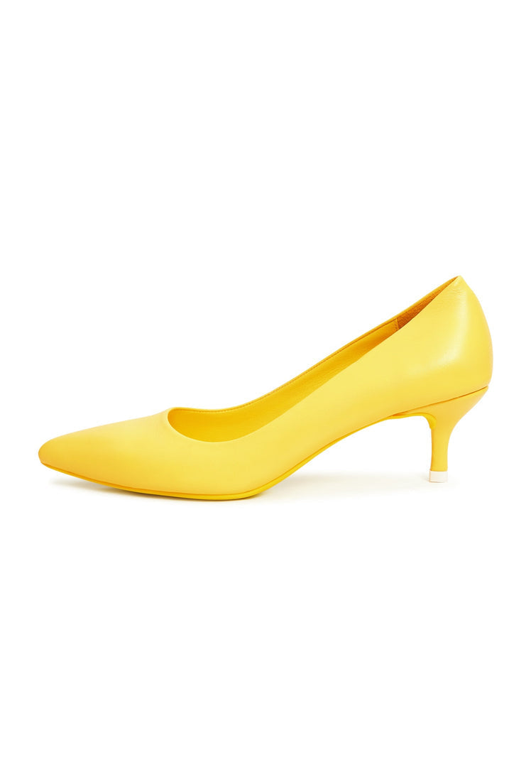 A pair of high-end yellow luxury pumps, the epitome of elegant footwear with designer heels.