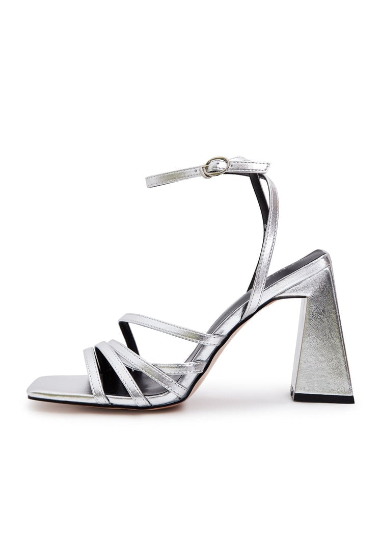 A pair of silver chunky comfort sandals with strappy design, perfect for women looking for stylish and comfortable platform sandals for casual summer wear.