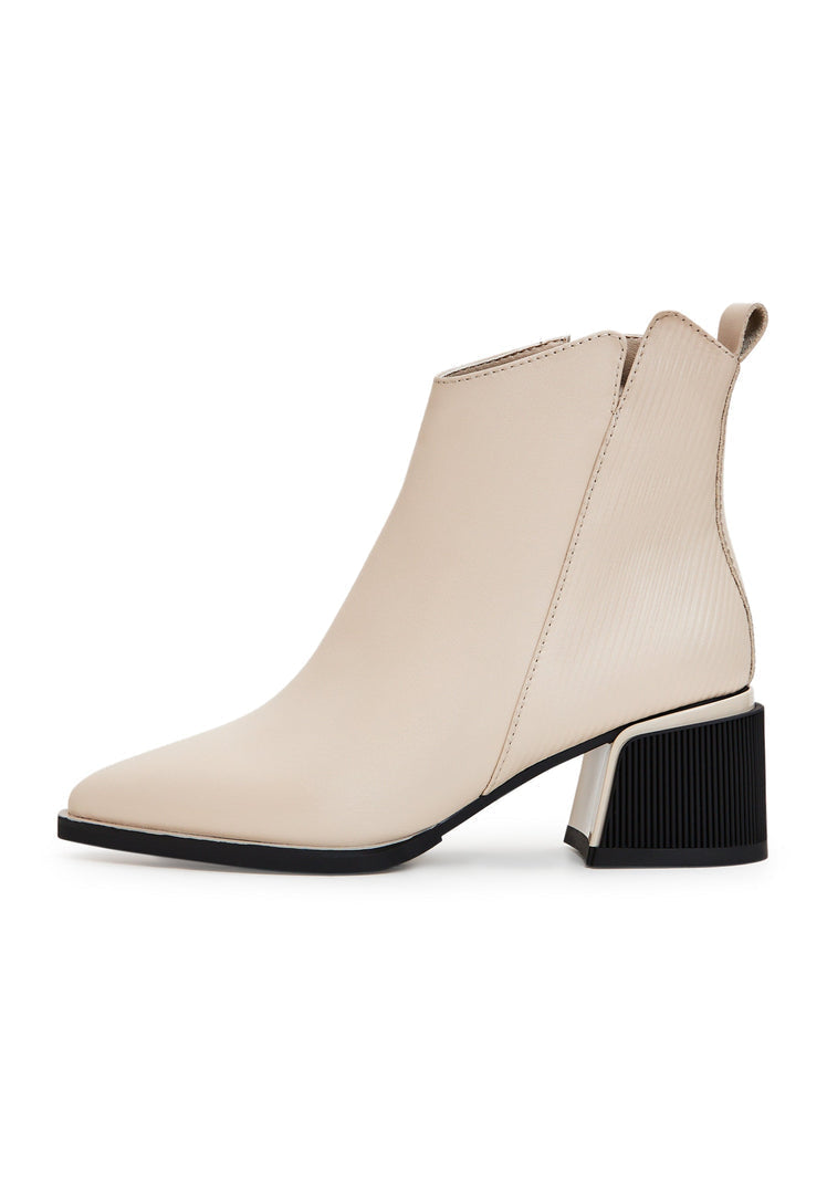 A pair of stylish beige women's ankle boots, perfect for completing a casual and fashionable look while remaining comfortable for all-day wear.