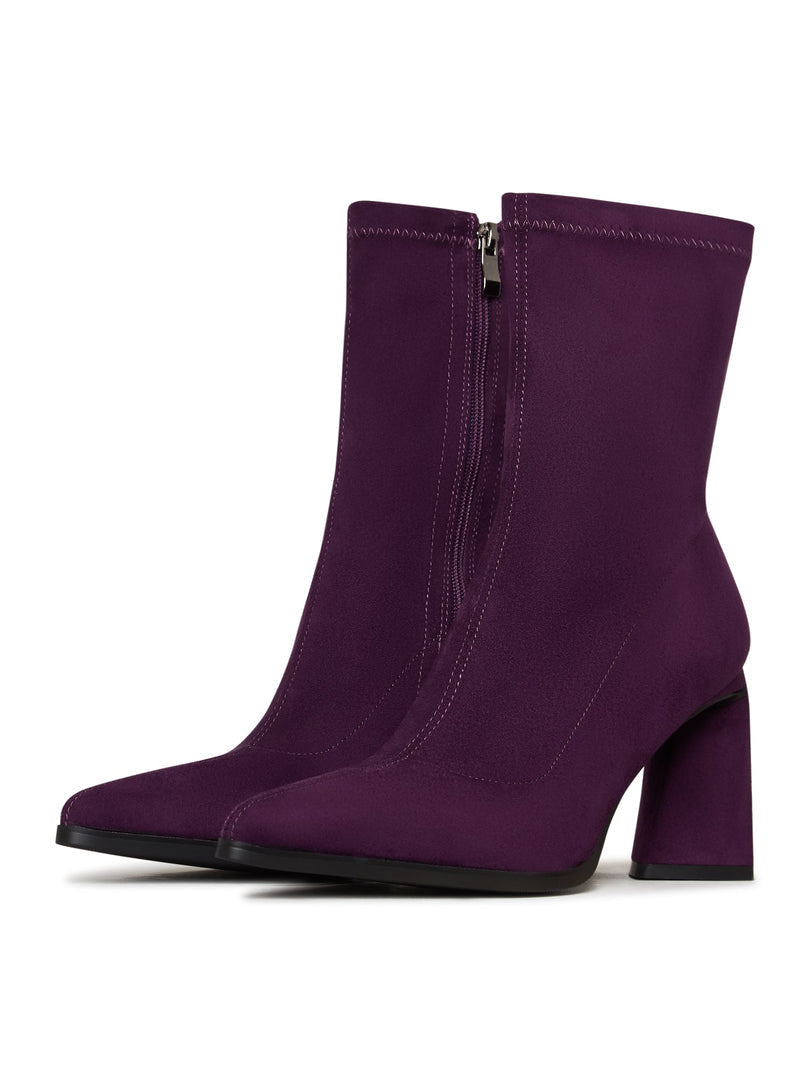 A pair of stylish purple suede ankle boots with a comfortable block heel, perfect for a casual day out.