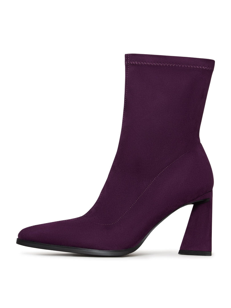 A pair of stylish purple suede ankle boots with block heels, perfect for casual wear.