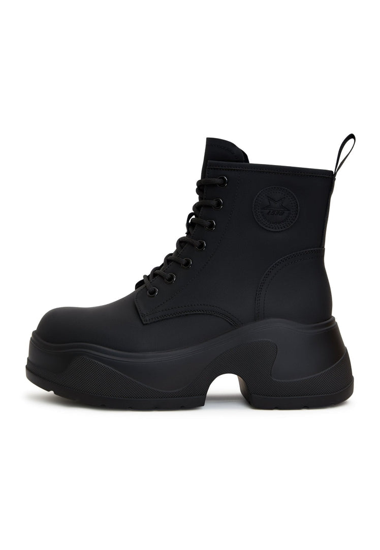 A chic pair of black platform ankle boots with chunky heels, a trendy and fashionable choice for any outfit.