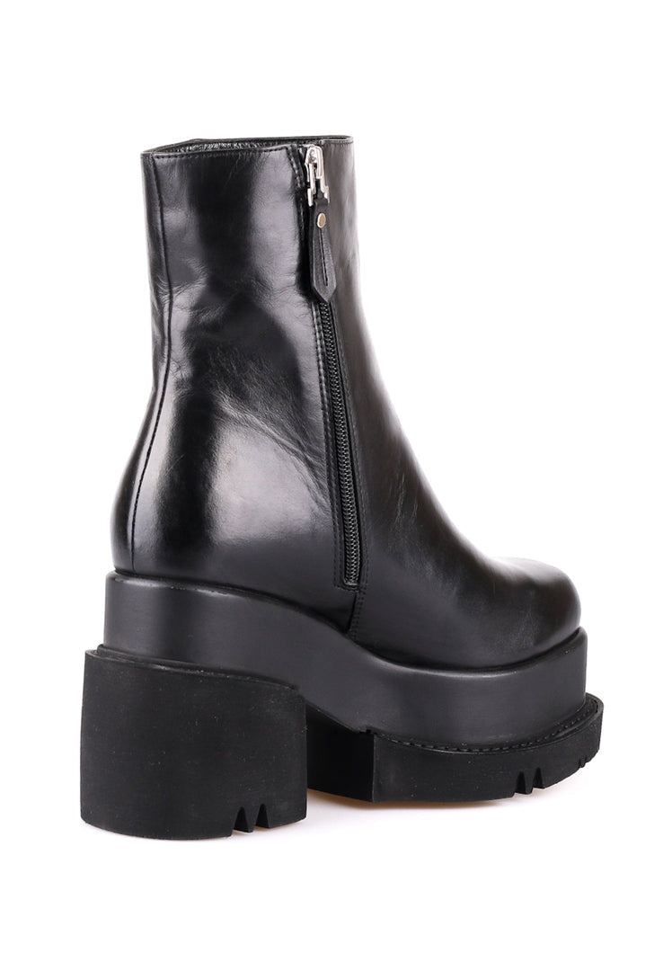 A stylish pair of chunky platform leather ankle boots, perfect for women who love trendy footwear.