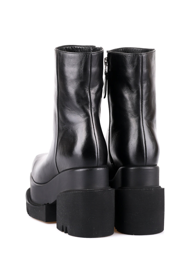 A stylish pair of chunky platform leather ankle boots, perfect for women looking for a trendy and elevated style.