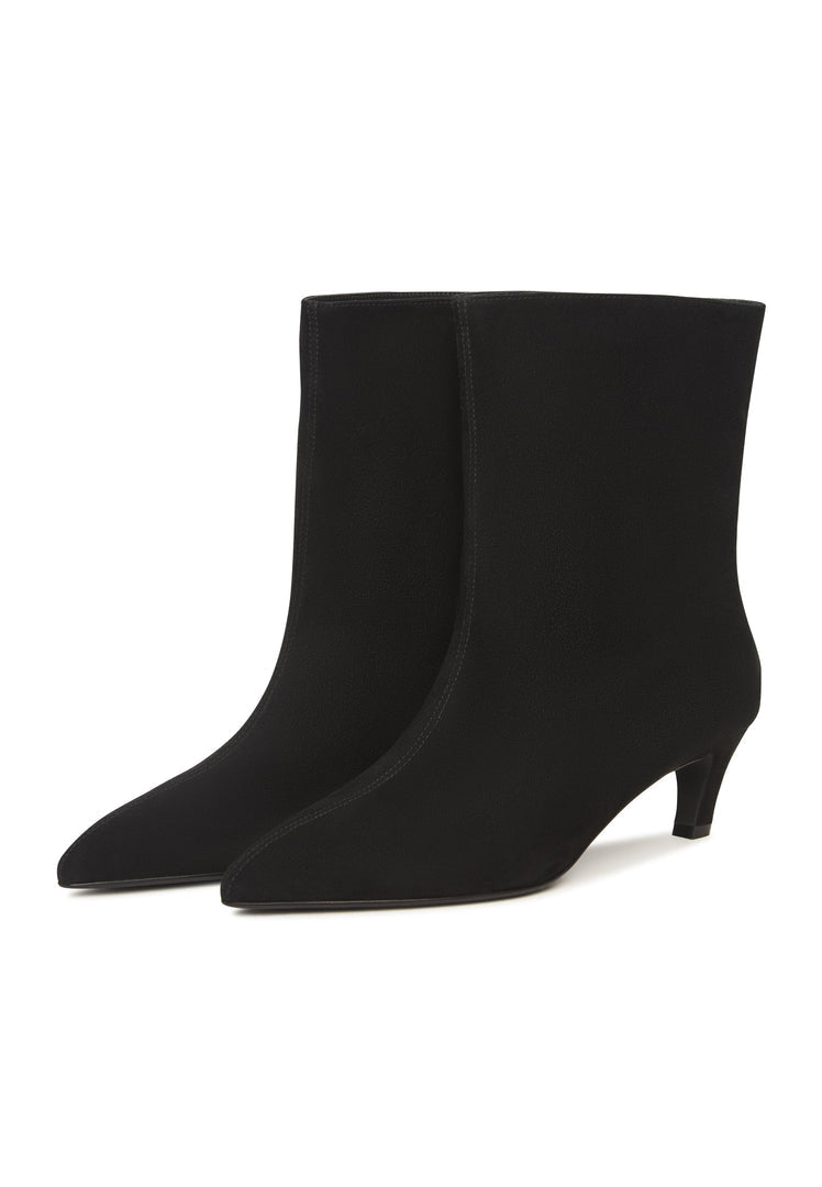 A stylish pair of black kitten heel ankle boots, perfect for any fashion-forward woman looking for trendy dolly style boots.