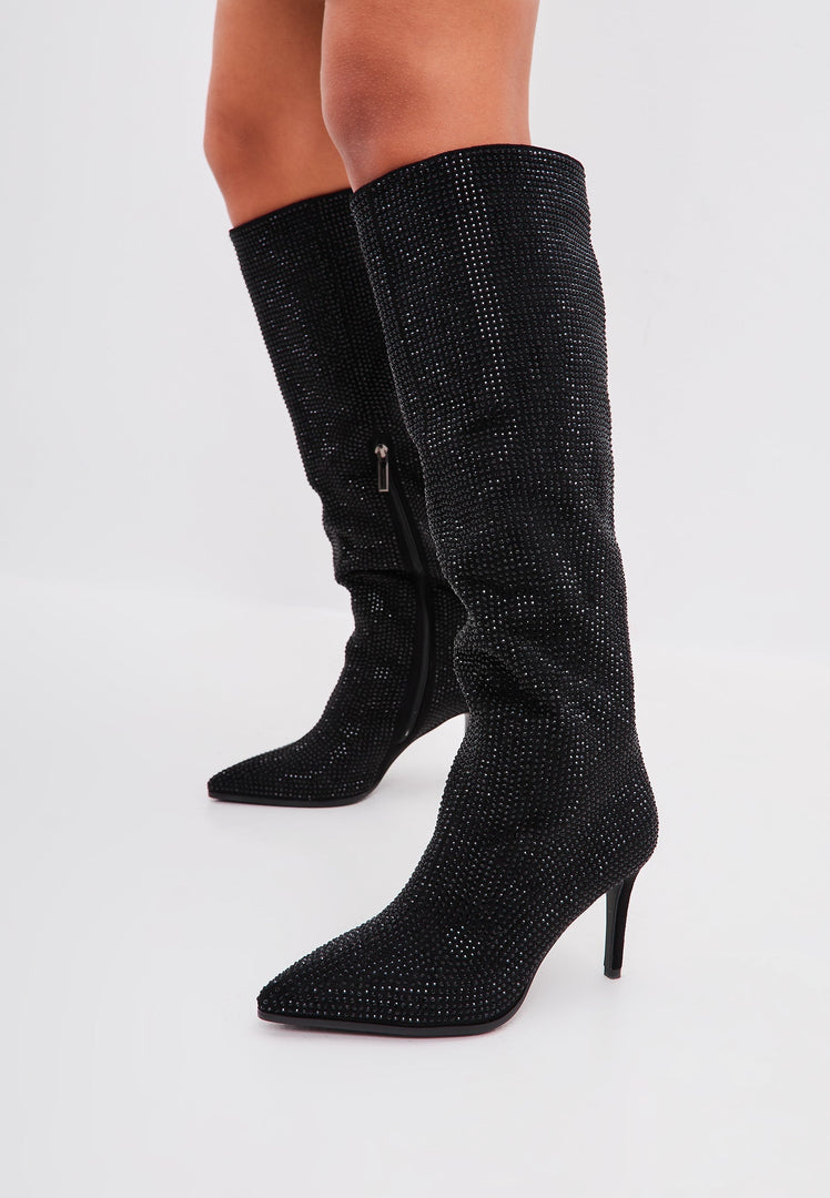 A trendy pair of Mili Black Jewel Stiletto Knee High Boots, perfect for any fashion-forward woman's wardrobe.