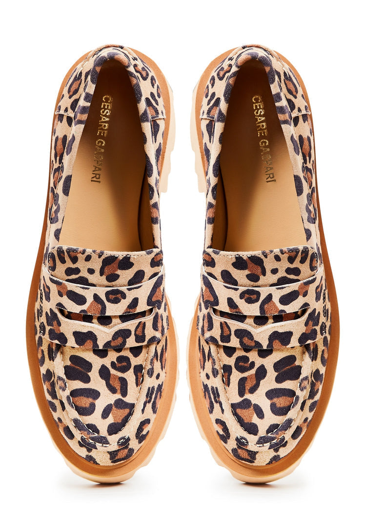 A pair of stylish chunky platform loafers in eye-catching leopard print, perfect for women wanting to make a bold statement with their footwear.
